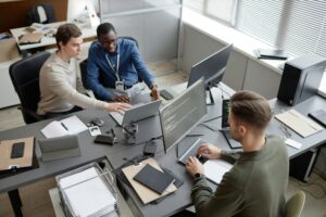 Cybersecurity Team Working on Project in Office