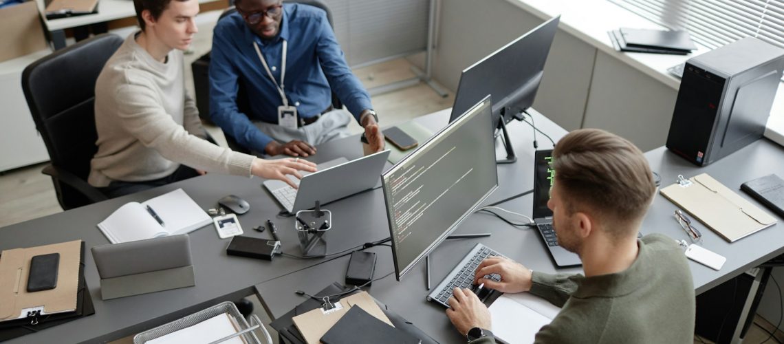 Cybersecurity Team Working on Project in Office