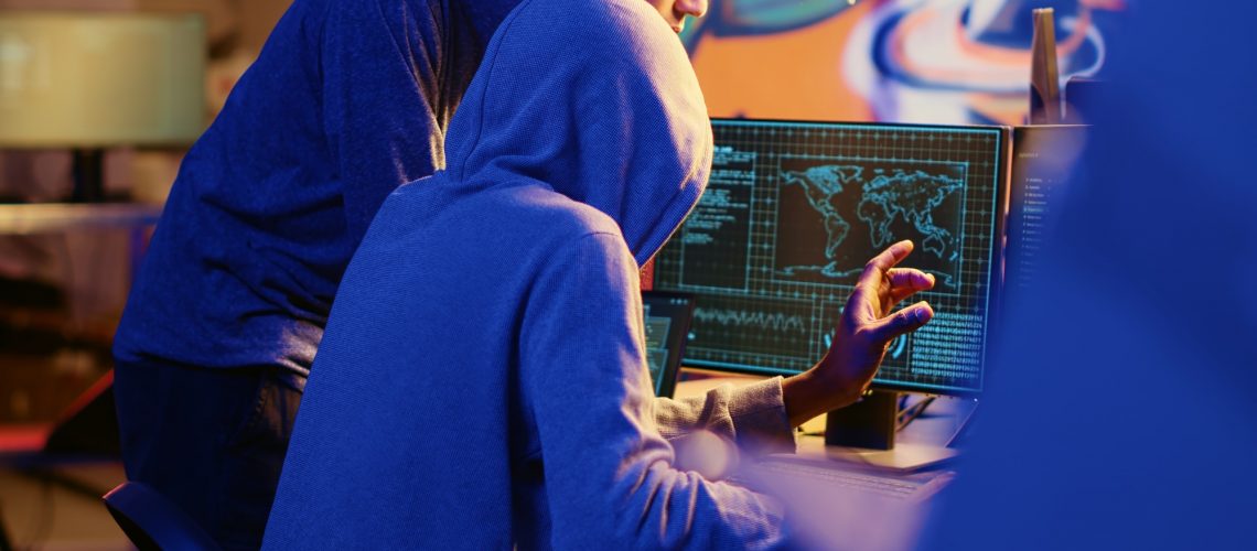 Hacker teaching youngster to hack PCs